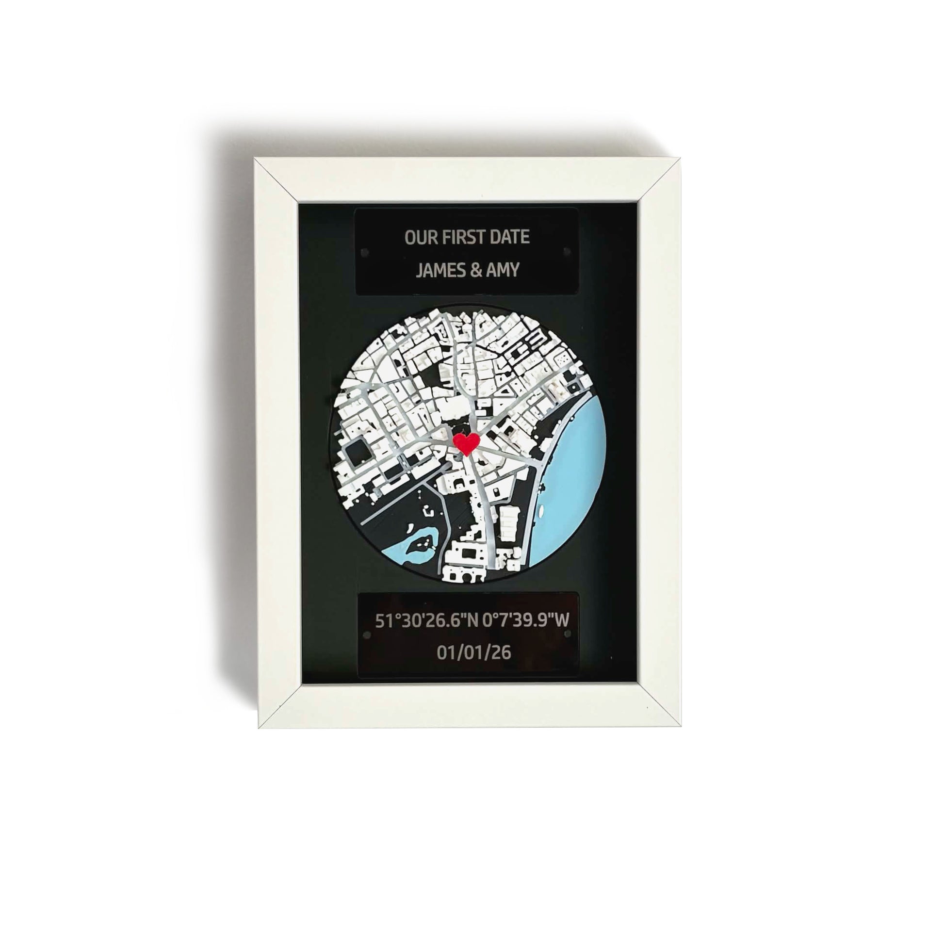 Personalised 3D map frame with white frame, engraved plaques, and red heart pin marking a custom location.